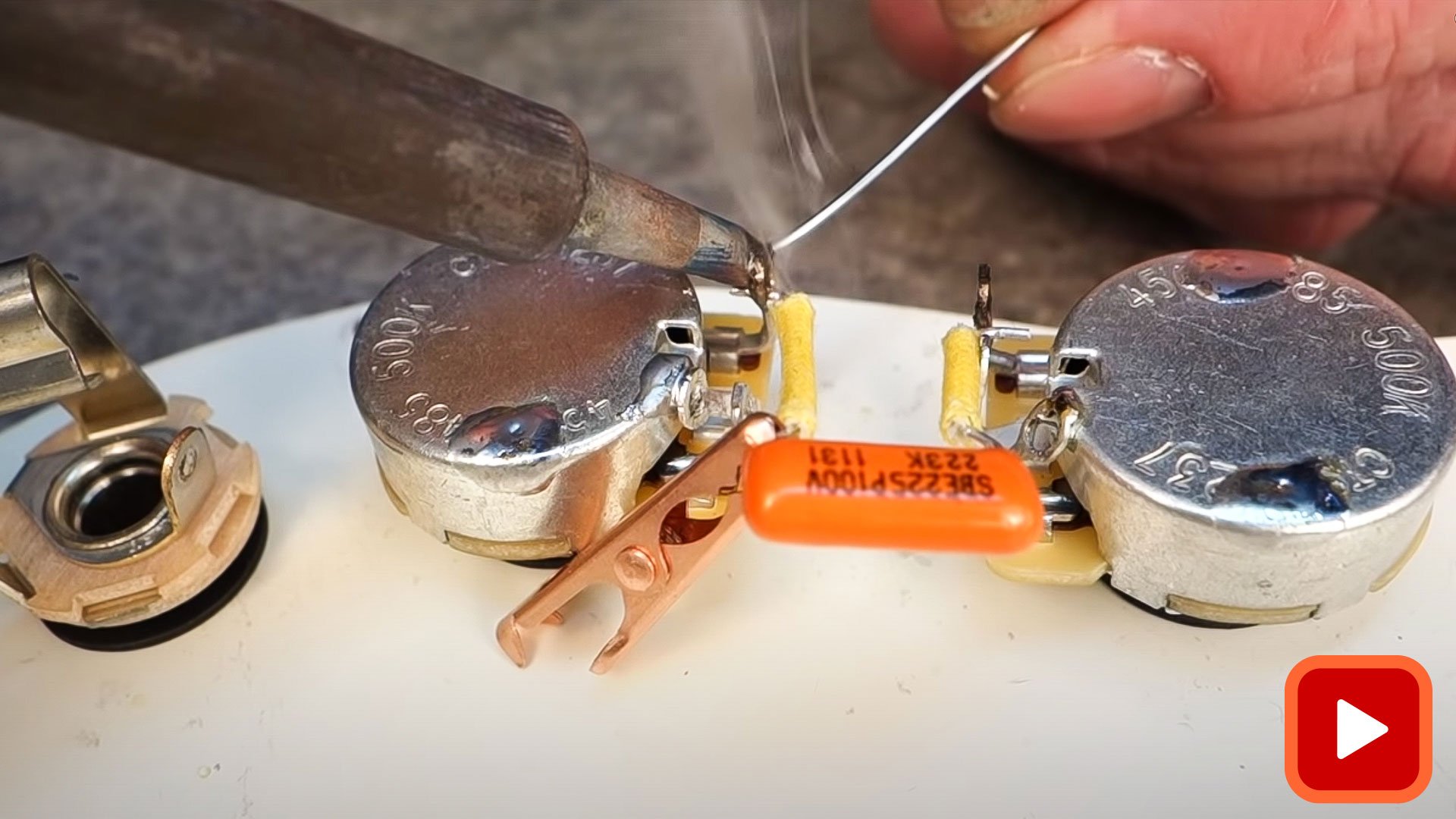 Soldering capacitors to potentiometers with heat sinks