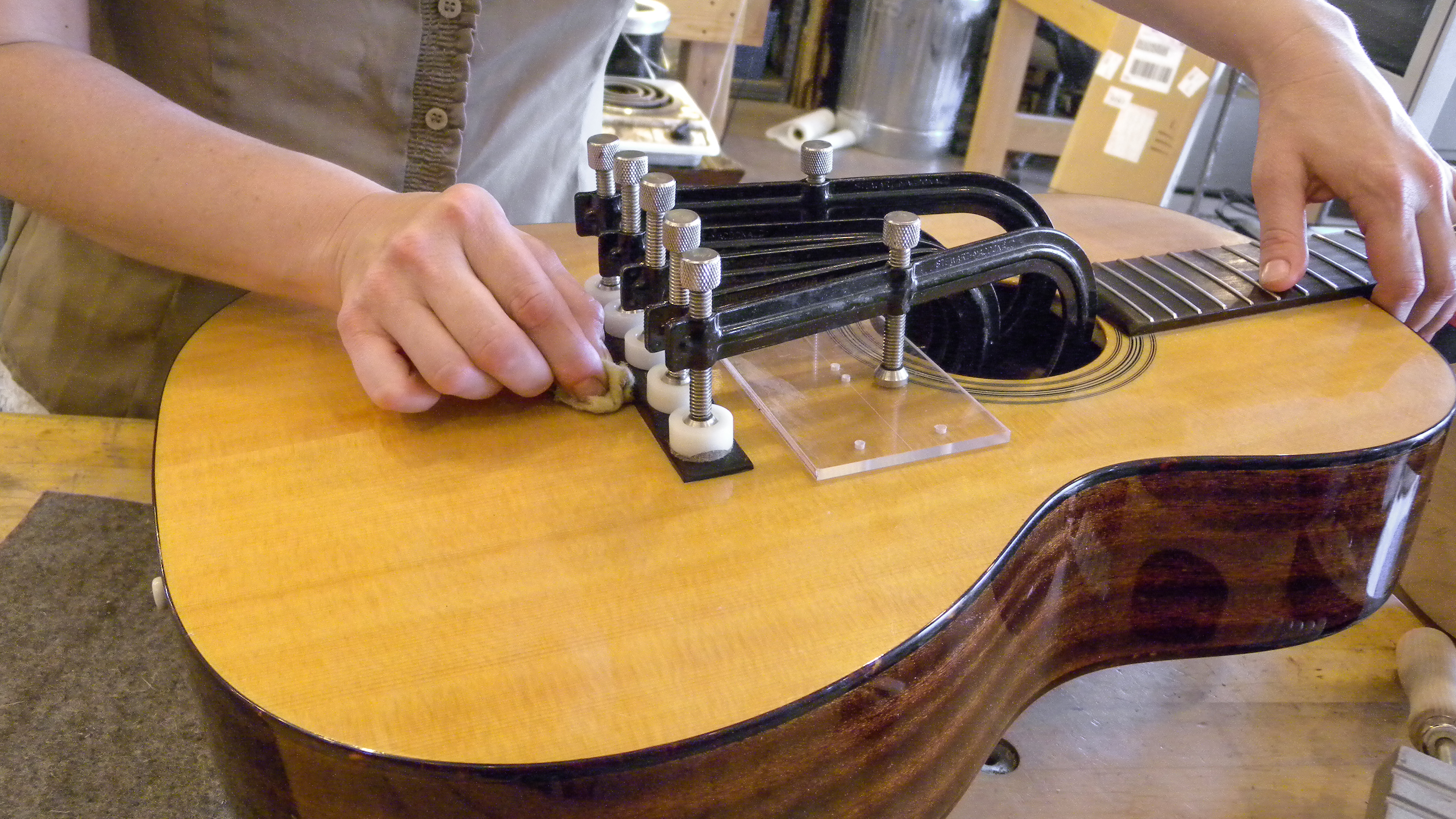 acoustic guitar bridge repair cost